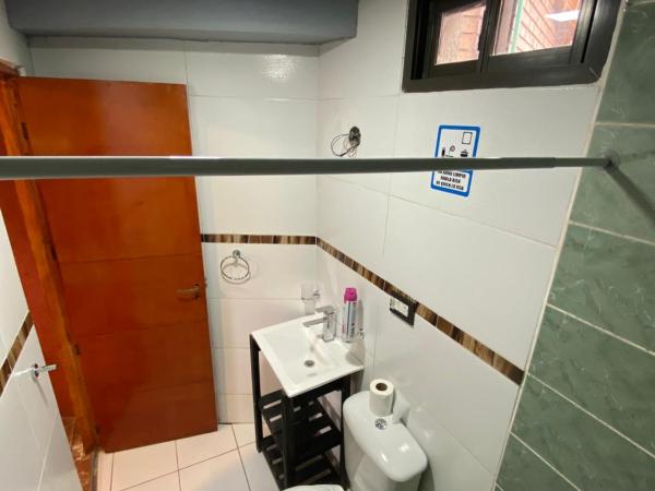 Hostel Ruca Potu : photo 9 de la chambre chambre triple avec salle de bains privative