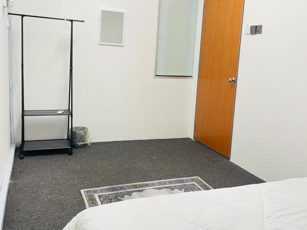 AK Greenrise Meru : photo 2 de la chambre chambre lit queen-size avec salle de bains commune