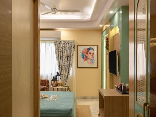 Hotel Sarang Palace - Boutique Stays : photo 9 de la chambre bohemian theme room with artistic rattan décor and designer washroom