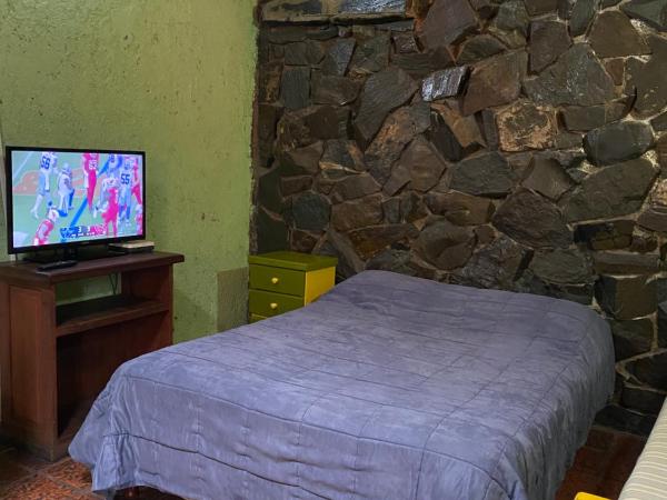Hostel Ruca Potu : photo 2 de la chambre chambre familiale