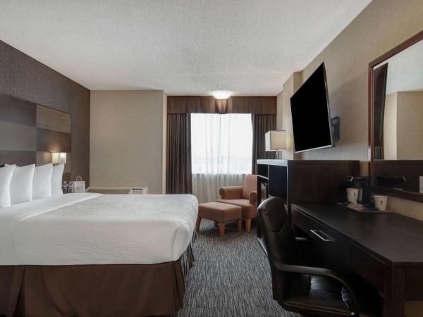 Days Inn by Wyndham Calgary South : photo 1 de la chambre chambre lit king-size affaires - non-fumeurs