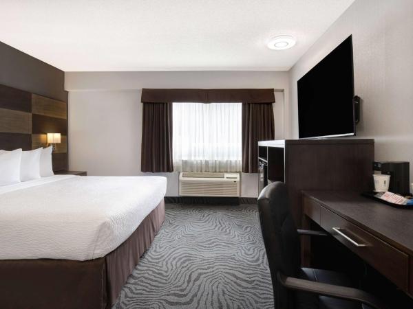 Days Inn by Wyndham Calgary South : photo 4 de la chambre chambre lit king-size - non-fumeurs