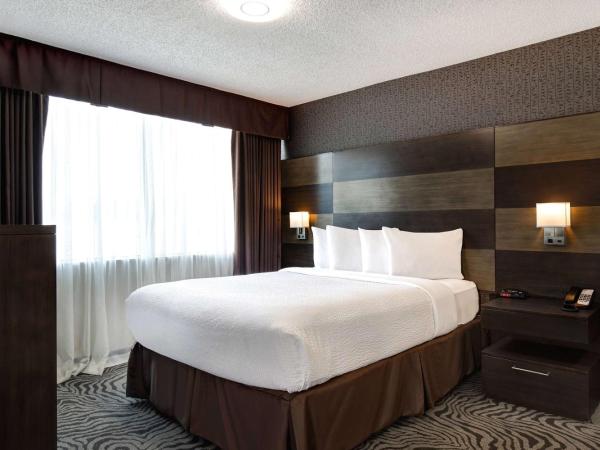 Days Inn by Wyndham Calgary South : photo 3 de la chambre chambre lit queen-size - non-fumeurs
