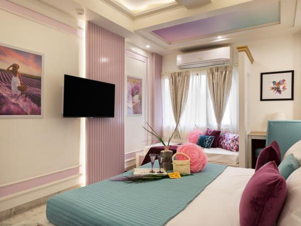 Hotel Sarang Palace - Boutique Stays : photo 8 de la chambre lavender theme neo modern room with designer bed and extra day bed