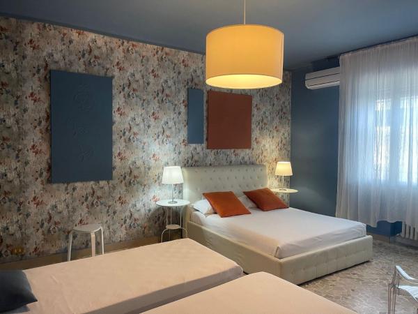 Central Suite Bed&Breakfast : photo 1 de la chambre chambre quadruple avec douche