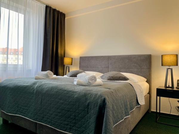 A-Austerlitz Hotel : photo 3 de la chambre suite supérieure lit king-size