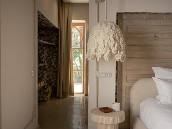 Les Palmiers Boutique Hôtel & Spa : photo 4 de la chambre suite junior avec terrasse