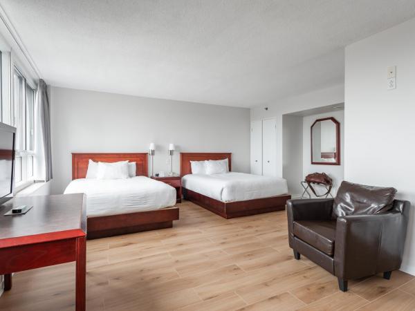 Hotel les Suites Labelle : photo 1 de la chambre studio supérieur avec 2 lits queen-size