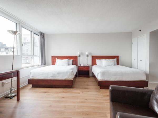 Hotel les Suites Labelle : photo 2 de la chambre studio supérieur avec 2 lits queen-size