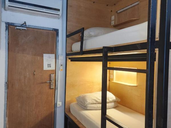 Mingle Highstreet : photo 7 de la chambre chambre lits jumeaux avec salle de bains commune