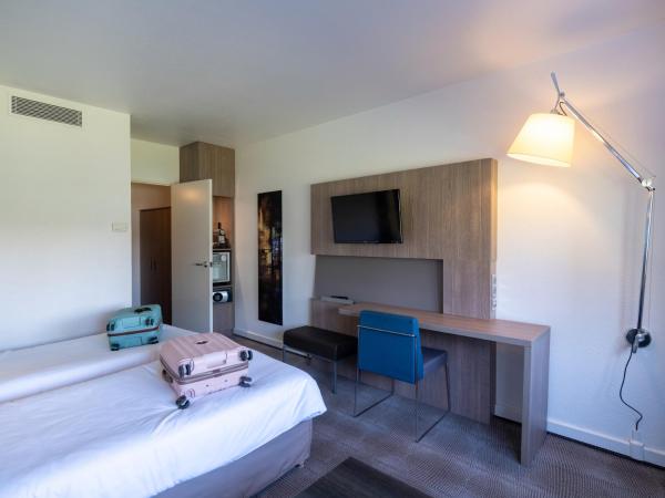 Novotel Nantes Centre Gare : photo 4 de la chambre chambre double supérieure avec canapé