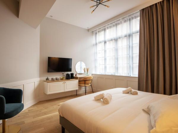 Les Suites Faidherbe : photo 8 de la chambre suite deluxe avec lit king-size