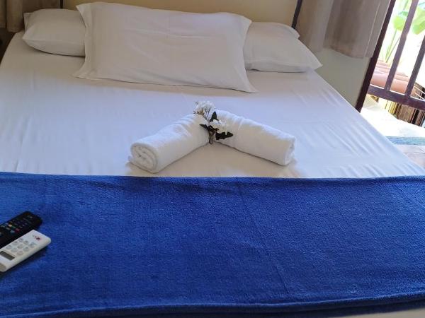 Pousada Flor D' Açucena : photo 1 de la chambre chambre double ou lits jumeaux avec salle de bains privative