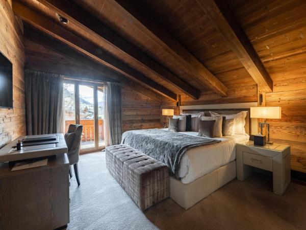 Ultima Gstaad Residences : photo 5 de la chambre appartement avec vue sur la montagne