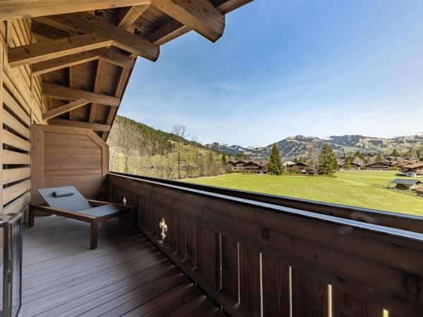 Ultima Gstaad Residences : photo 4 de la chambre appartement avec vue sur la montagne