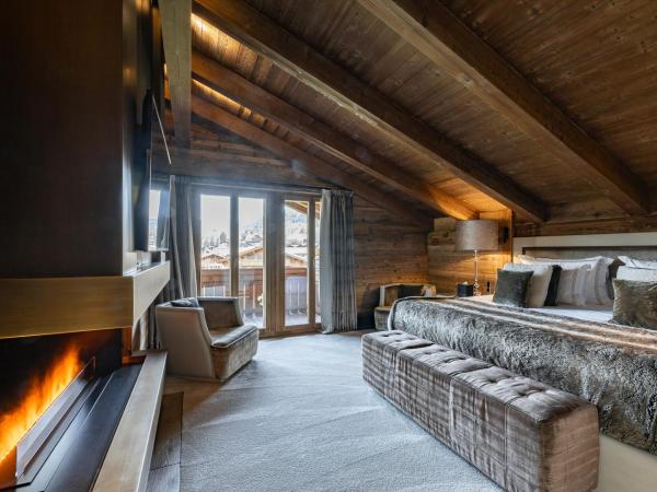 Ultima Gstaad Residences : photo 3 de la chambre appartement avec vue sur la montagne