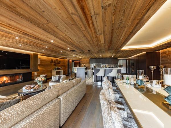 Ultima Gstaad Residences : photo 7 de la chambre appartement avec balcon