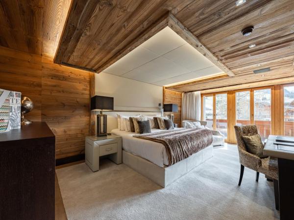 Ultima Gstaad Residences : photo 6 de la chambre appartement avec balcon