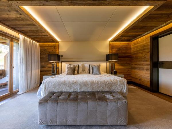 Ultima Gstaad Residences : photo 4 de la chambre appartement avec balcon