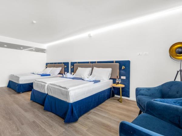 Del Mar Emotion Resort : photo 1 de la chambre chambre quadruple supérieure avec balcon