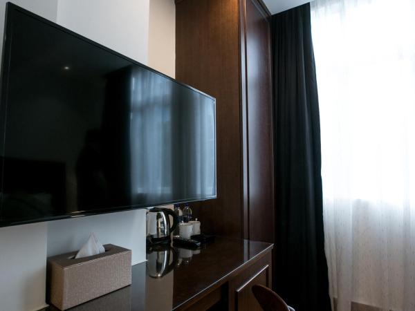 Belllo Hotel JB Central : photo 3 de la chambre chambre lit queen-size deluxe