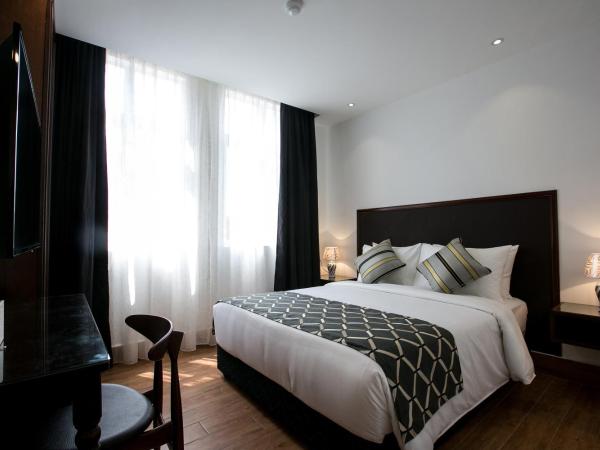 Belllo Hotel JB Central : photo 1 de la chambre chambre lit queen-size deluxe