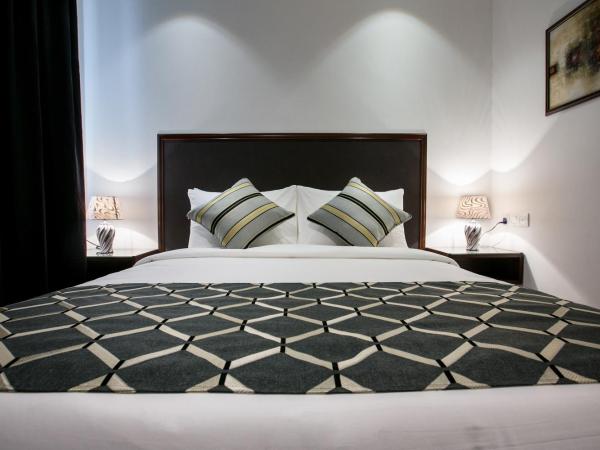 Belllo Hotel JB Central : photo 2 de la chambre chambre lit queen-size deluxe