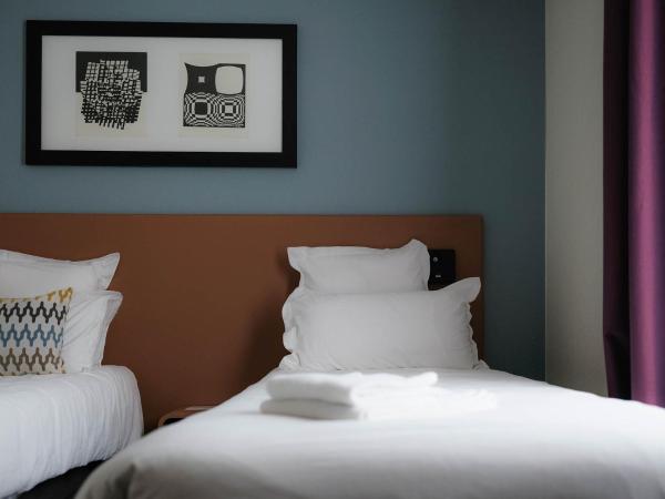 Logis Hôtel de l'Europe : photo 3 de la chambre chambre lits jumeaux confort - non-fumeurs