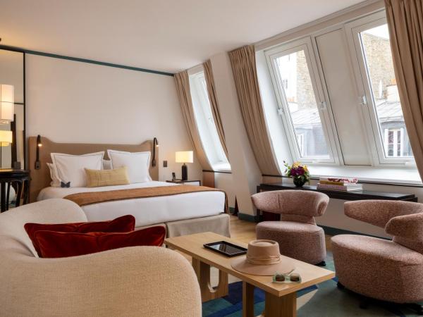 Hôtel Bel Ami : photo 1 de la chambre suite avec bouteille de champagne offerte et accès au spa & salle de sport