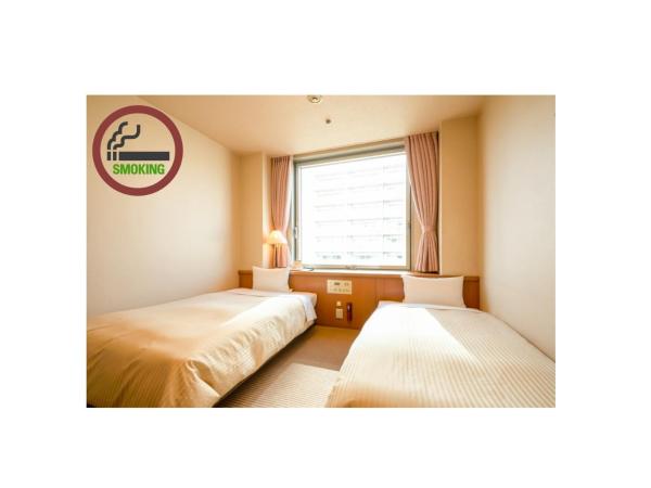 Hiroshima City Bunka Koryu Kaikan : photo 1 de la chambre chambre lits jumeaux Économique - fumeurs