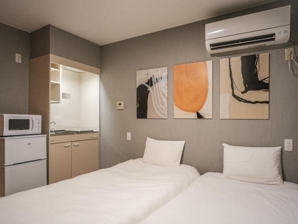 殿堂 : photo 6 de la chambre chambre lits jumeaux avec baignoire