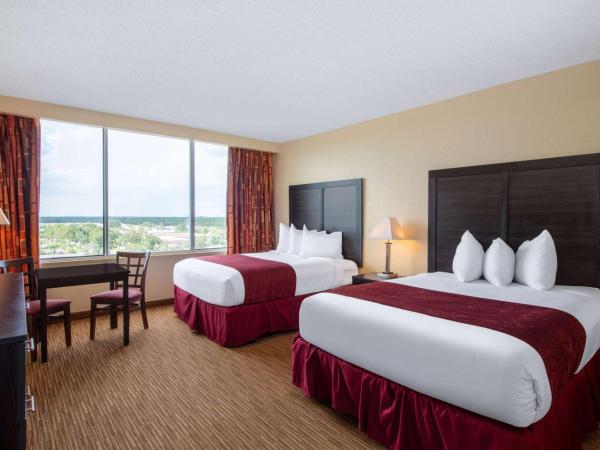 Ramada by Wyndham Kissimmee Gateway - Free Theme Park Shuttle : photo 1 de la chambre chambre tour deluxe 2 lits queen-size