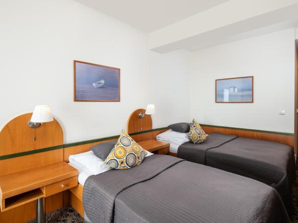 Hotel Troja : photo 2 de la chambre chambre triple deluxe