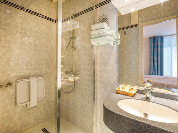 Hotel Terminus Montparnasse : photo 7 de la chambre chambre lits jumeaux exécutive