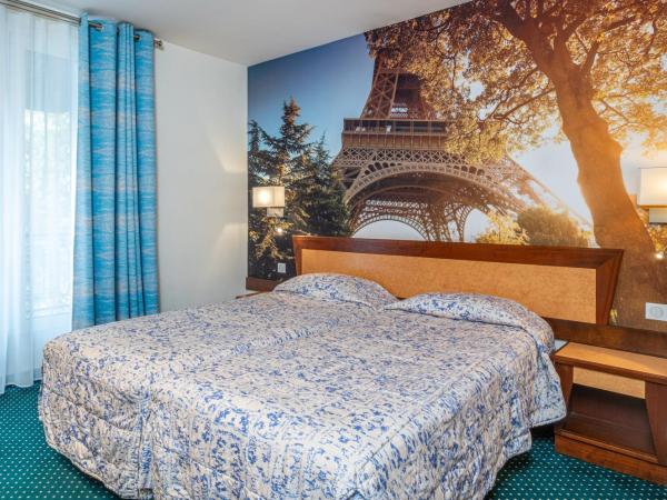 Hotel Terminus Montparnasse : photo 4 de la chambre chambre lits jumeaux excutive
