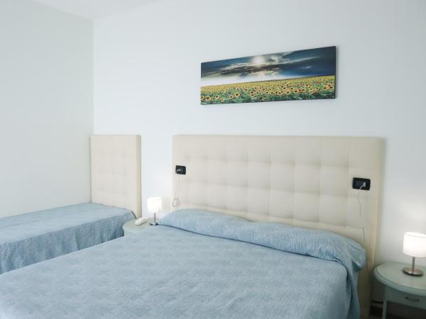 Hotel La Bussola : photo 2 de la chambre chambre familiale (2 adultes + 2 enfants de moins de 11 ans)