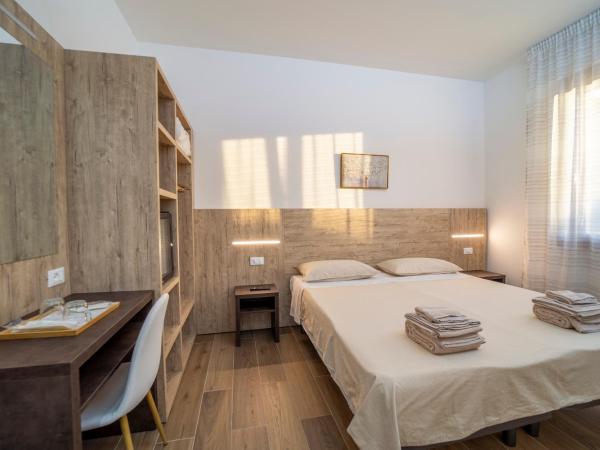 Mentana Rooms : photo 2 de la chambre chambre double ou lits jumeaux avec salle de bains privative