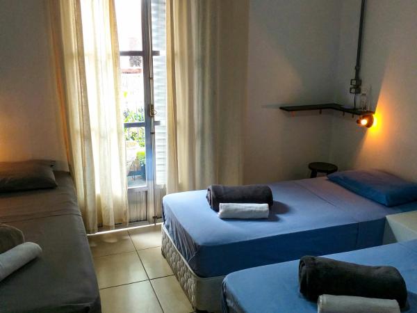Micasa Hostel - Congonhas : photo 4 de la chambre chambre triple avec salle de bains privative