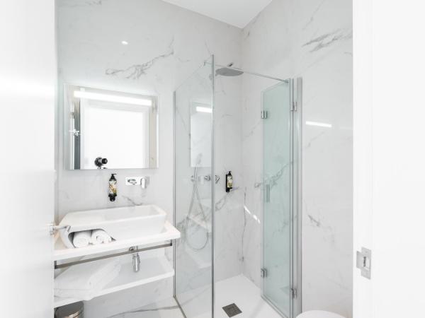 Avenida Viana Boutique Suites : photo 5 de la chambre chambre double avec balcon