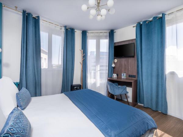 The Originals Boutique, Hôtel Le Marignan,Le Havre Centre Gare : photo 2 de la chambre chambre double ou lits jumeaux deluxe avec balcon