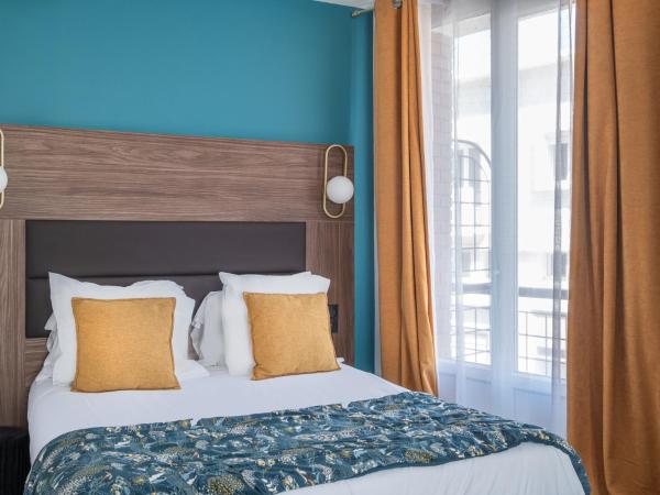 The Originals Boutique, Hôtel Le Marignan,Le Havre Centre Gare : photo 1 de la chambre suite familiale avec balcon