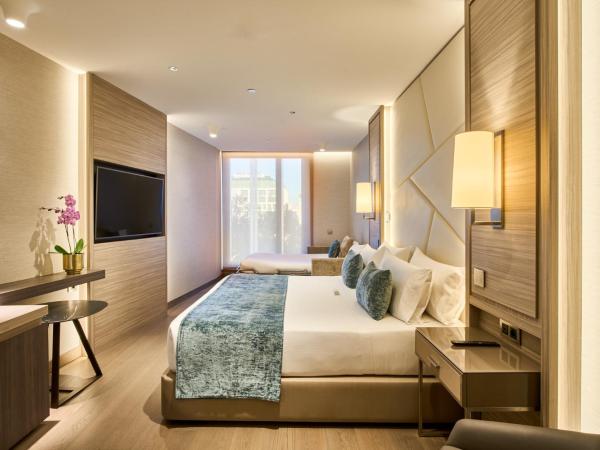 VP Plaza España Design : photo 4 de la chambre chambre triple deluxe