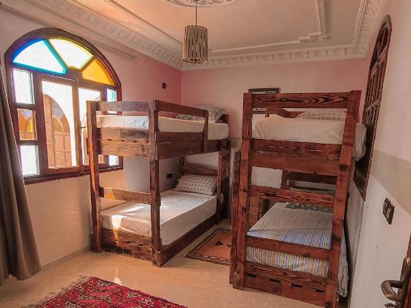 The Sunrise Villa : photo 4 de la chambre chambre quadruple - vue sur jardin