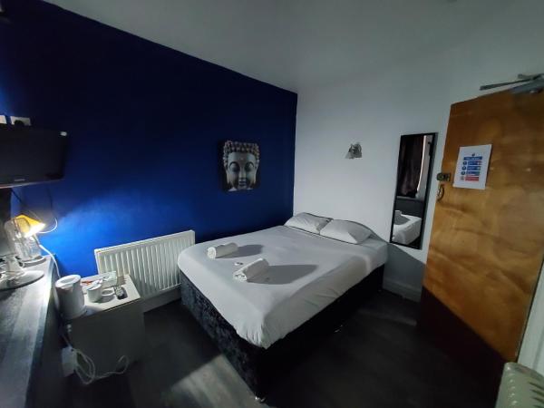 Henson Hotel Pleasure Beach : photo 1 de la chambre petite chambre double