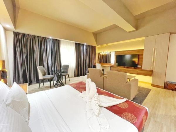 The Avenue M : photo 2 de la chambre suite exécutive