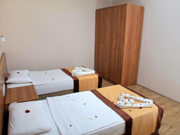 Yeniacun Apart Hotel : photo 5 de la chambre appartement 1 chambre avec balcon - vue sur jardin