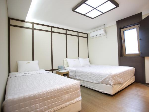 Hotel MIDO Myeongdong : photo 1 de la chambre chambre triple