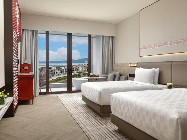 HUALUXE Hotels and Resorts Sanya Yalong Bay Resort : photo 3 de la chambre hébergement standard avec 2 lits doubles - vue sur océan