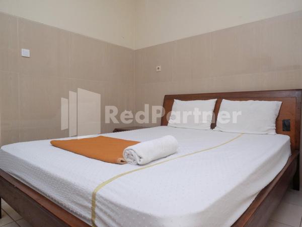 Wisma Garuda Syariah Condoongcatur Mitra RedDoorz : photo 1 de la chambre chambre double standard