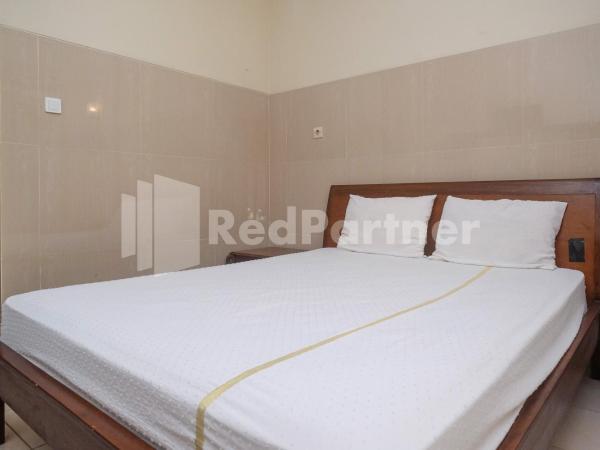 Wisma Garuda Syariah Condoongcatur Mitra RedDoorz : photo 3 de la chambre chambre double standard